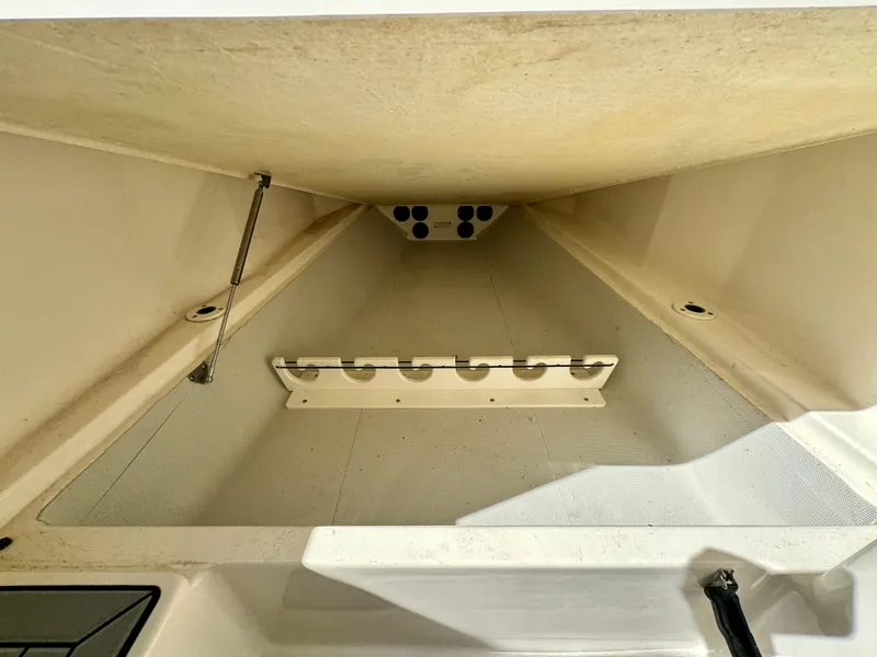 Slide: The Image of Storage compartment of 2020 Cobia 350 Center Console boat, featuring organized interior space. - 42