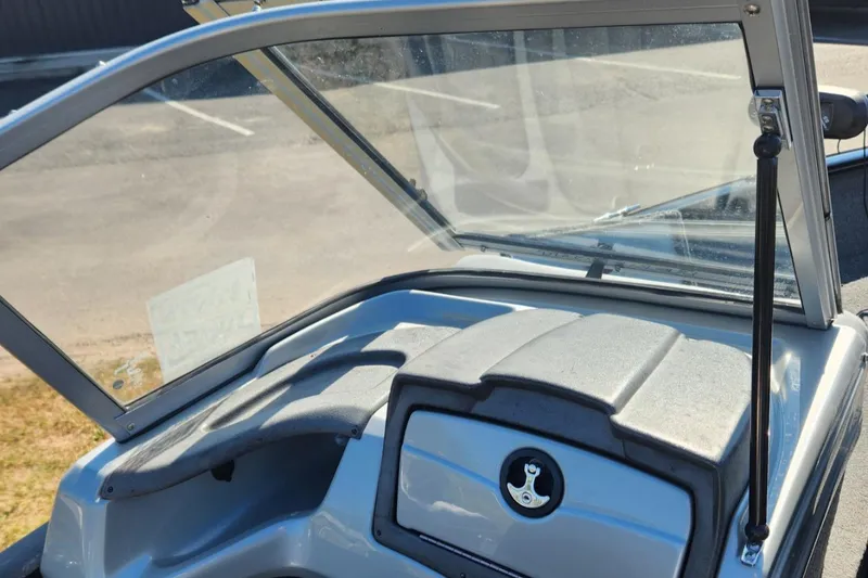 Slide: The Image of 2019 Tracker Pro V 175 Guide boat interior with windshield and dashboard. - 16