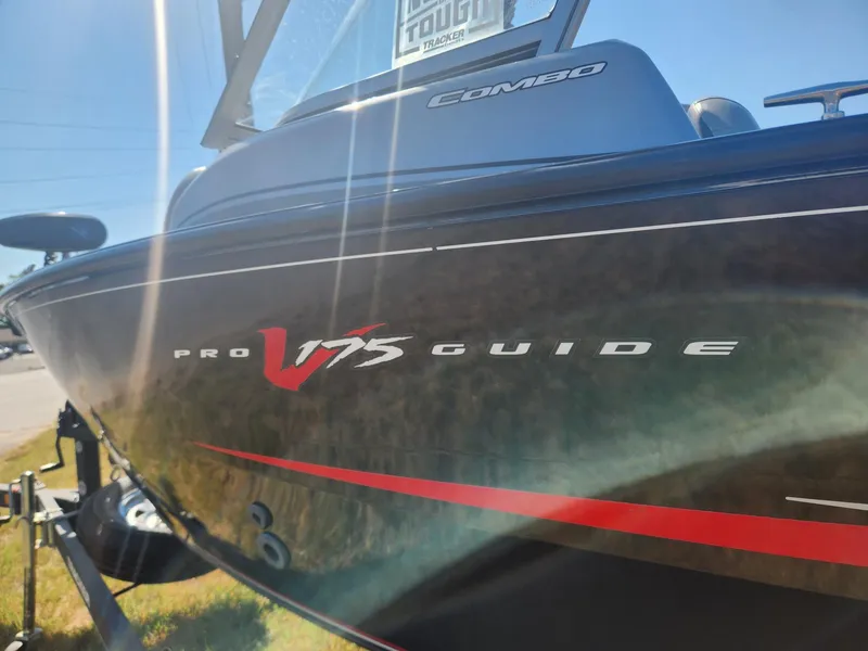 Slide: The Image of 2019 Tracker Pro V 175 Guide boat, side view with logo and sunlight reflection. - 5