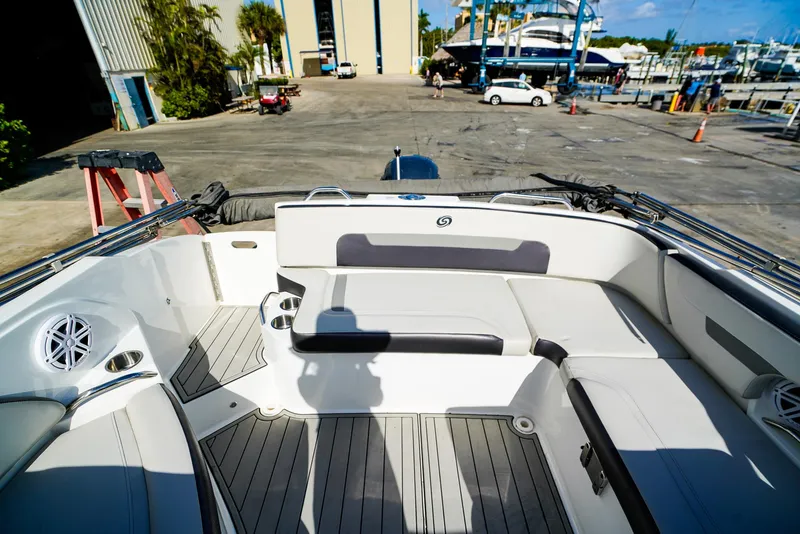 Slide: The Image of 2021 Hurricane SunDeck 235 OB boat interior with spacious seating and modern design. - 3
