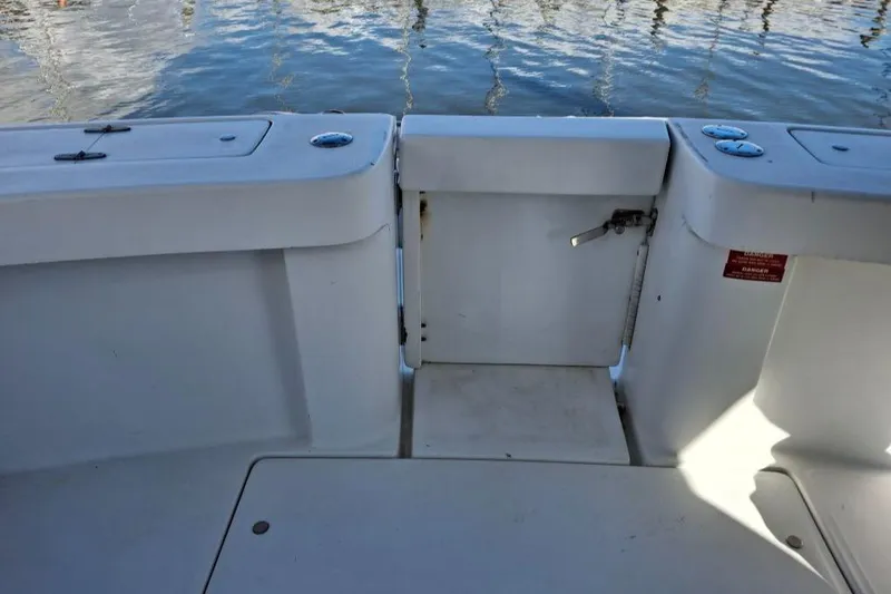 Slide: The Image of 1997 Mainship 350 boat deck with water view in the background. - 30