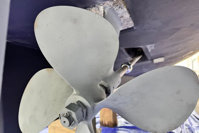 Slide: The Image of Propeller of 1997 Mainship 350 boat, close-up view. - 5