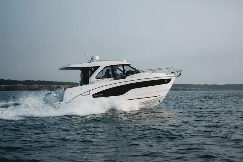 Slide: The Image of 2025 Beneteau Antares 9 cruising on open water, showcasing sleek design and performance. - 5