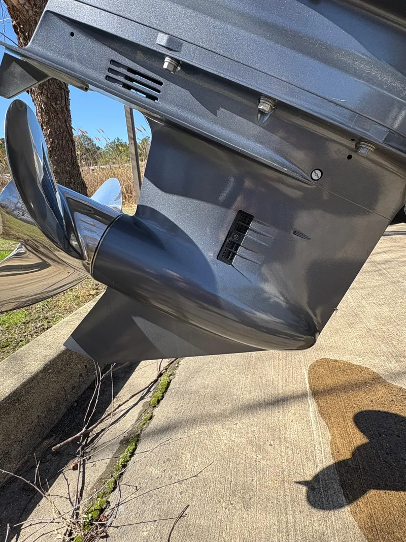 Slide: The Image of Close-up of a 2022 Tidewater 198 CC Adventure boat propeller on a sunny day. - 14