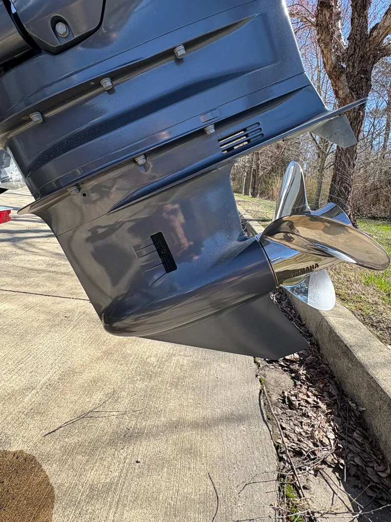 Slide: The Image of Close-up of a 2022 Tidewater 198 CC Adventure boat's outboard motor and propeller. - 15