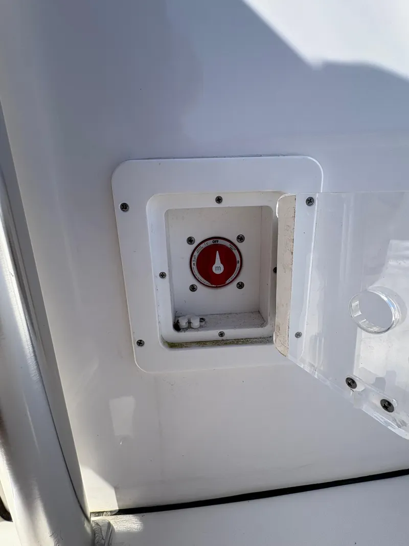 Slide: The Image of 2022 Tidewater 198 CC Adventure boat battery switch panel. - 24