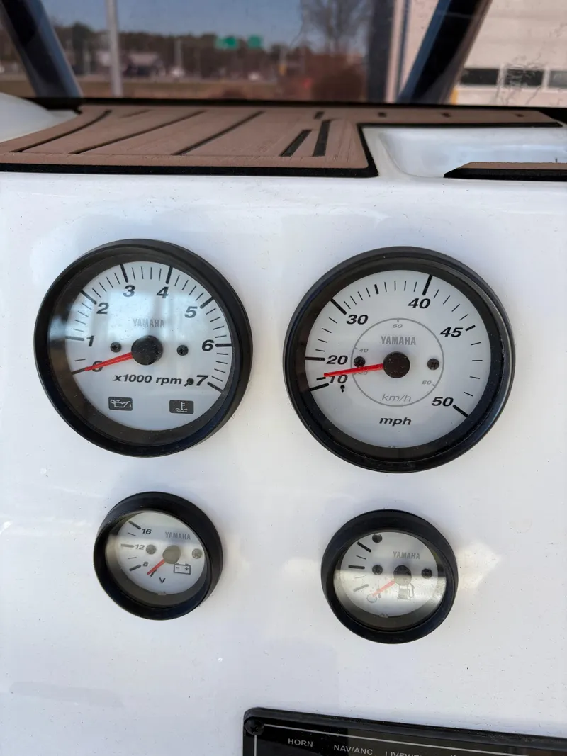 Slide: The Image of Dashboard of 2022 Tidewater 198 CC Adventure boat with Yamaha gauges. - 26