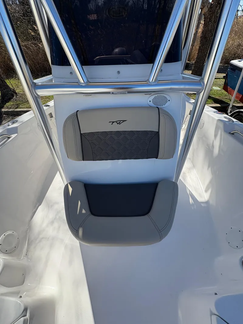 Slide: The Image of 2022 Tidewater 198 CC Adventure boat seat with sleek design and comfortable padding. - 34