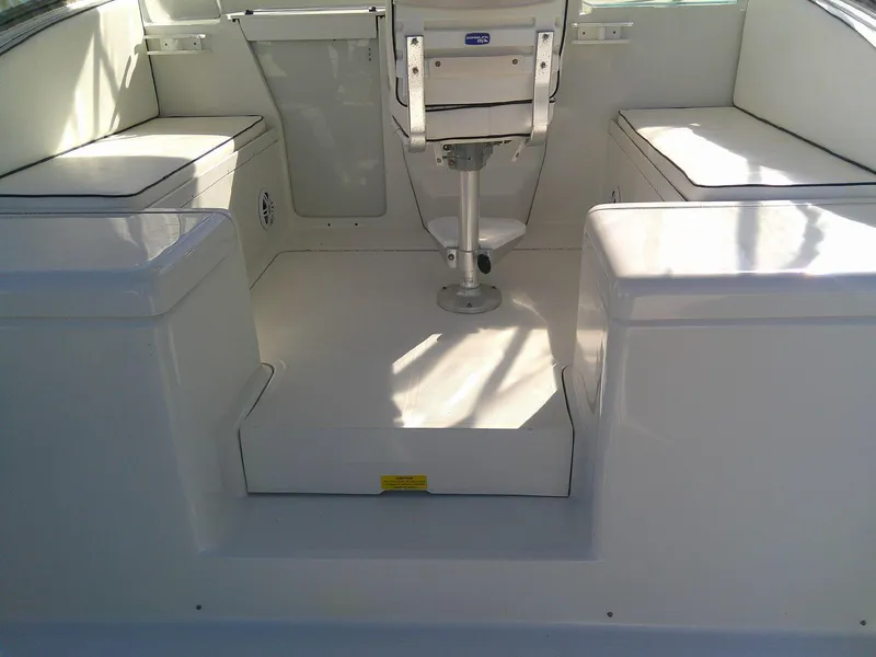 Slide: The Image of 2000 Luhrs Tournament 290 Open boat interior with seating and helm chair. - 16