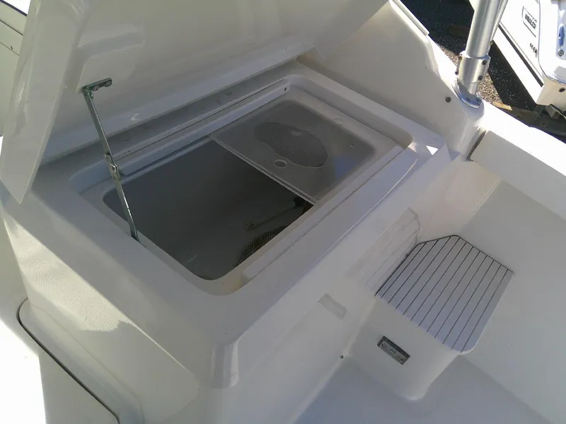 Slide: The Image of Open storage compartment on 2000 Luhrs Tournament 290 Open boat. - 20
