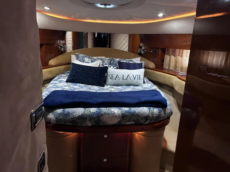 Slide: The Image of Luxurious bedroom interior of 2006 Viking Princess 61 Flybridge yacht with elegant bedding. - 24