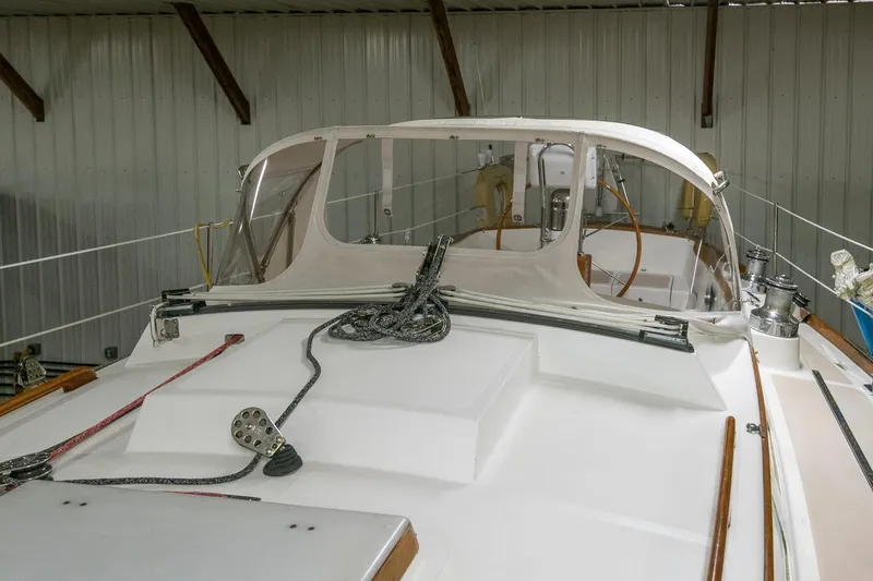 Slide: The Image of Hinckley Sou'wester 42 Sloop, 1994 model, docked in a covered marina. - 13