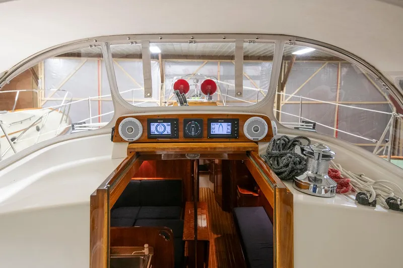 Slide: The Image of Hinckley Sou'wester 42 Sloop 1994 cockpit with navigation instruments and cozy interior view. - 20
