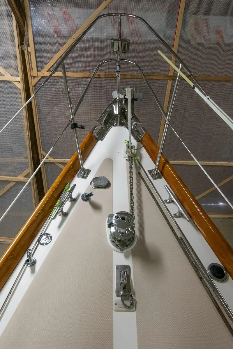 Slide: The Image of Hinckley Sou'wester 42 Sloop 1994, deck view with winch and railing in storage. - 16