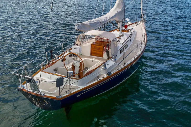 Slide: The Image of Hinckley Sou'wester 42 Sloop, 1994 model, sailing on calm waters. - 3