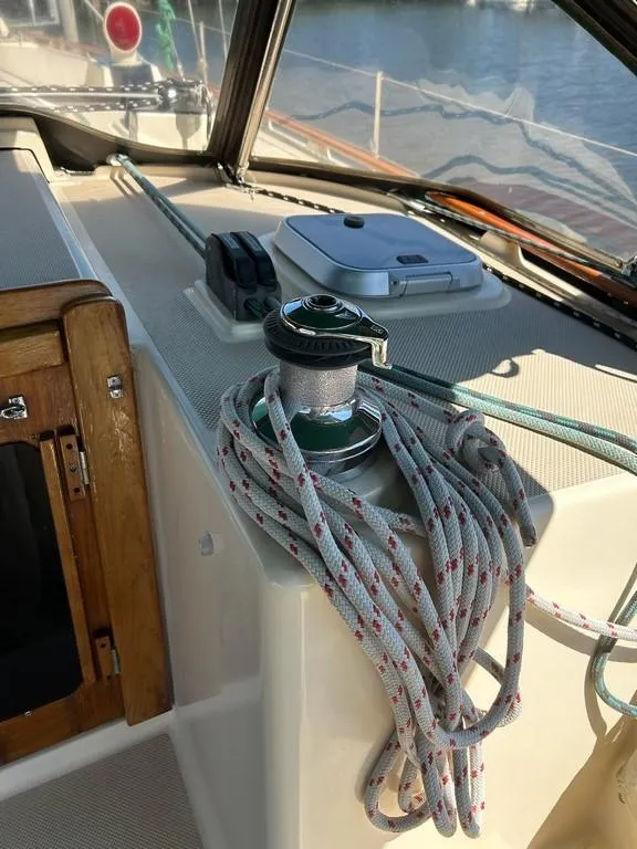 Slide: The Image of Cockpit of 1998 Island Packet 40 sailboat with winch and ropes. - 24