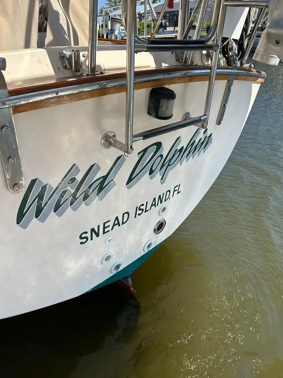 Slide: The Image of Island Packet 40 sailboat, "Wild Dolphin," docked at Snead Island, FL, 1998 model. - 49