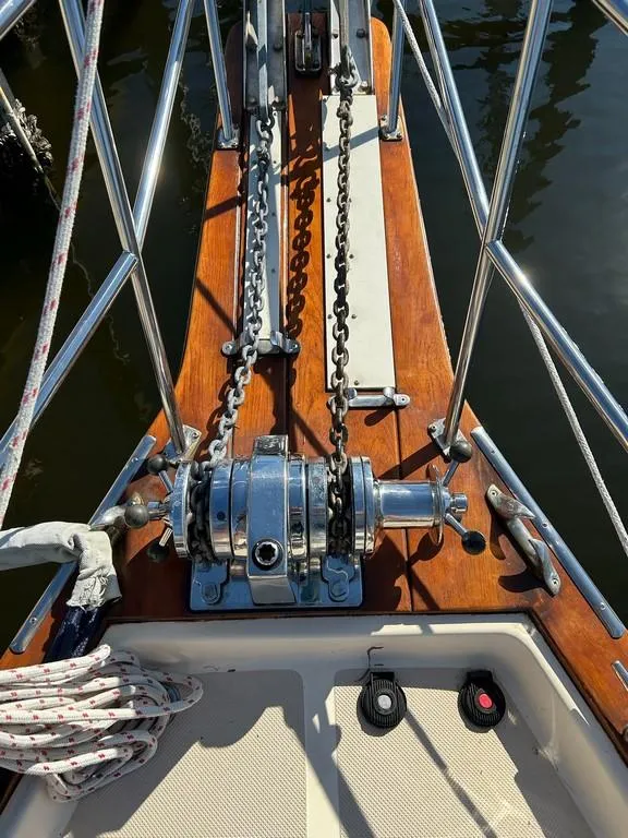 Slide: The Image of Bow of 1998 Island Packet 40 sailboat with anchor windlass and chains. - 6