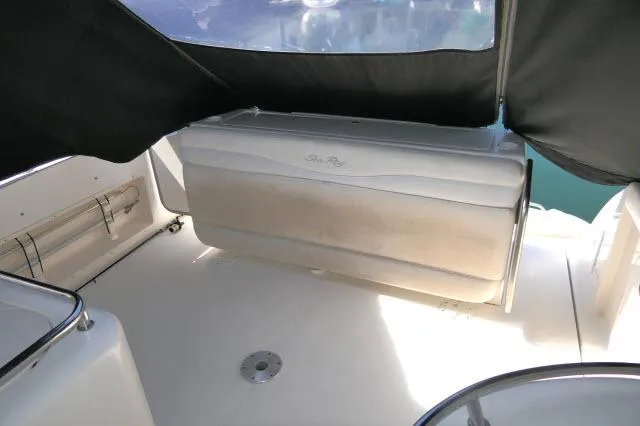Slide: The Image of 2005 Sea Ray 340 Sundancer interior with seating and covered area. - 24