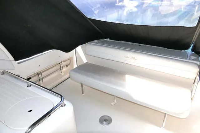 Slide: The Image of 2005 Sea Ray 340 Sundancer interior with seating and covered area. - 25