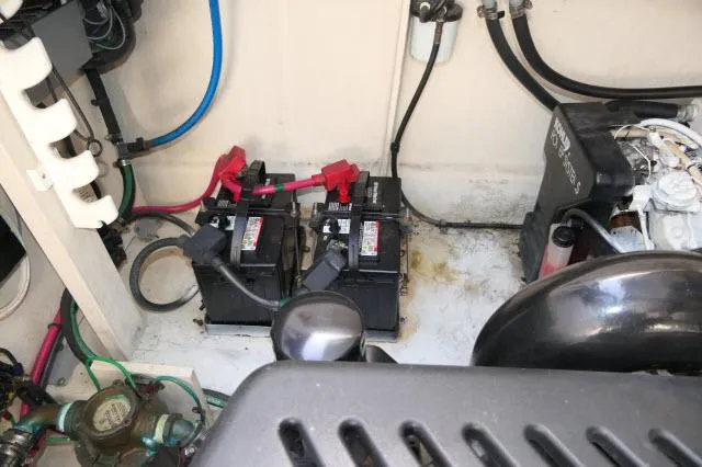 Slide: The Image of Engine compartment of 2005 Sea Ray 340 Sundancer with batteries and wiring. - 41