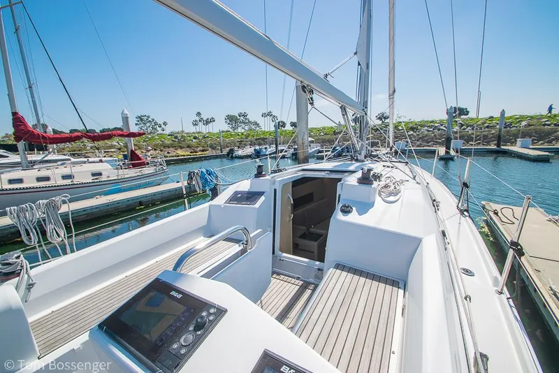 Slide: The Image of Beneteau Oceanis 30.1 sailboat, 2022 model, docked in a sunny marina. - 26
