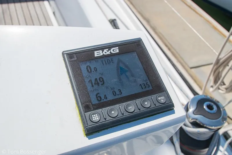 Slide: The Image of B&G navigation display on 2022 Beneteau Oceanis 30.1 sailboat, showing tide and speed data. - 30