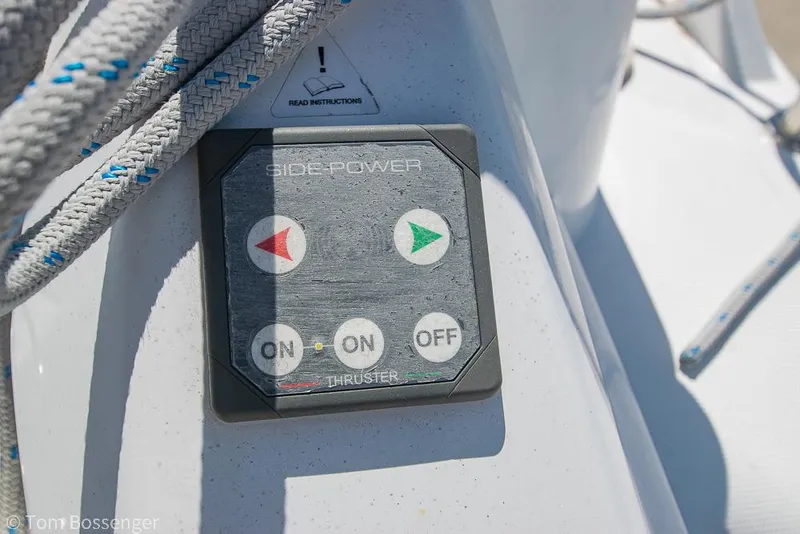 Slide: The Image of Control panel on 2022 Beneteau Oceanis 30.1 sailboat, featuring Side-Power thruster buttons. - 31