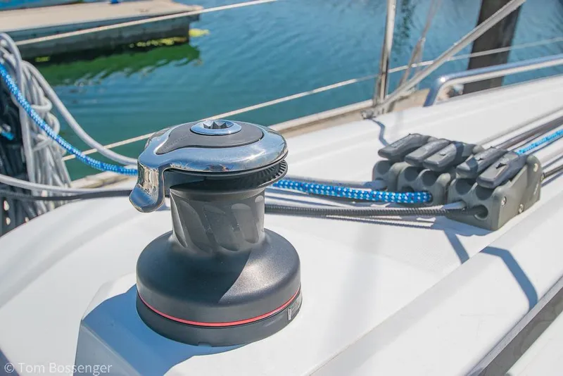 Slide: The Image of Winch and ropes on 2022 Beneteau Oceanis 30.1 sailboat deck, dockside view. - 33