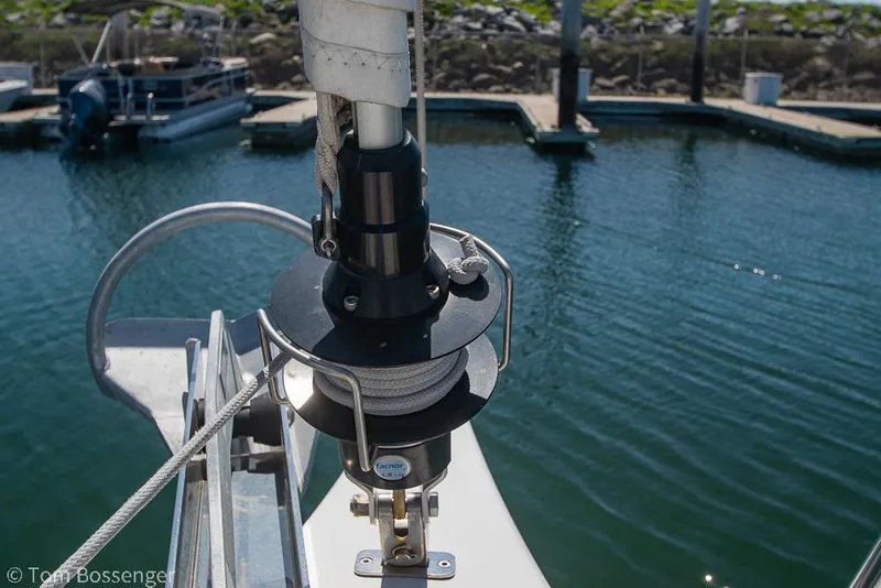 Slide: The Image of Furling system on a 2022 Beneteau Oceanis 30.1 sailboat docked at a marina. - 37