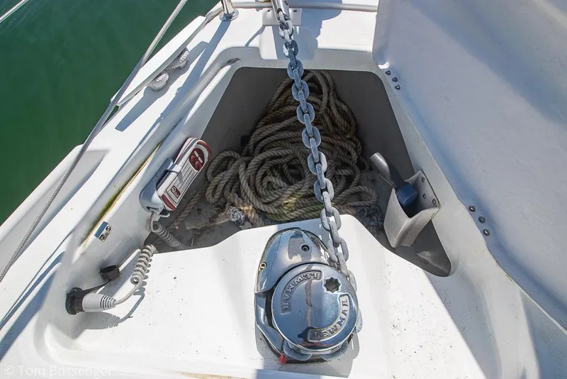 Slide: The Image of Anchor chain and rope storage on 2022 Beneteau Oceanis 30.1 sailboat deck. - 38