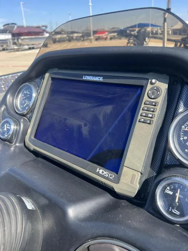 Slide: The Image of Dashboard of a 2015 Triton 20TRX with Lowrance HDS12 display. - 15