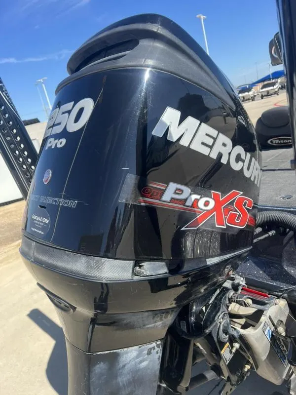 Slide: The Image of Mercury 250 Pro XS outboard motor on a 2015 Triton 20TRX boat. - 19