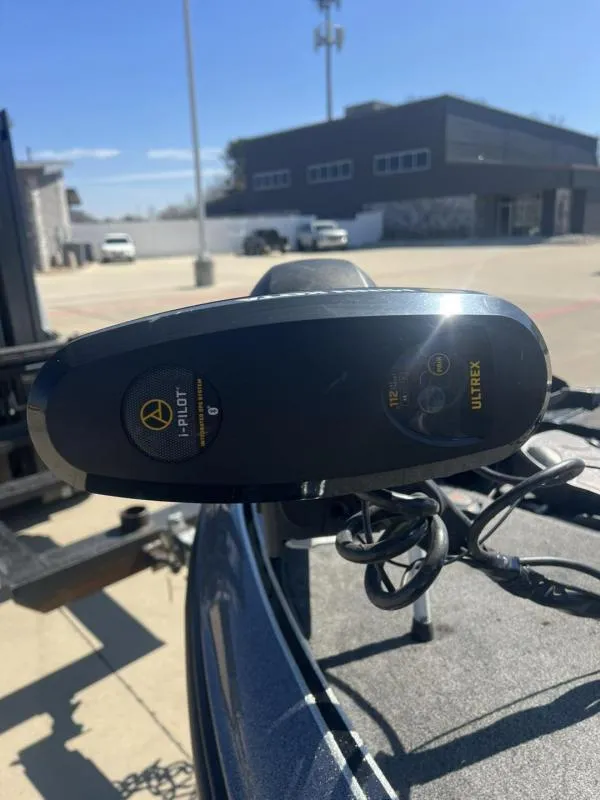 Slide: The Image of Close-up of a 2015 Triton 20TRX boat's Ultrex i-Pilot trolling motor. - 22