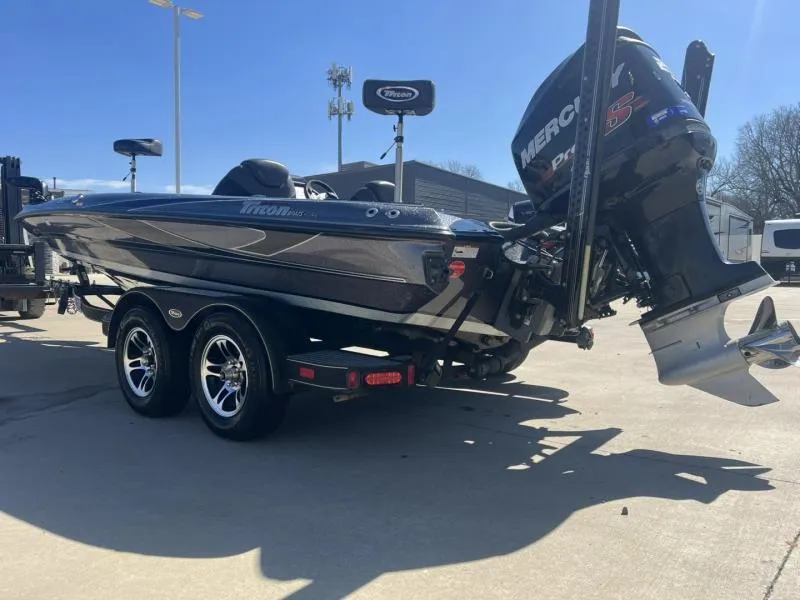 Slide: The Image of 2015 Triton 20TRX boat with Mercury Pro XS engine on a trailer. - 5
