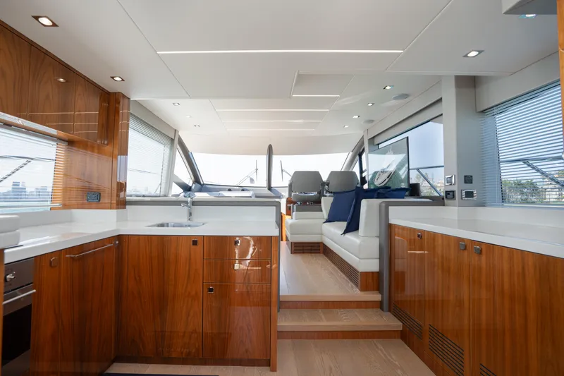 Slide: The Image of Luxurious interior of 2020 Sunseeker 52 Manhattan yacht with modern kitchen and seating area. - 10