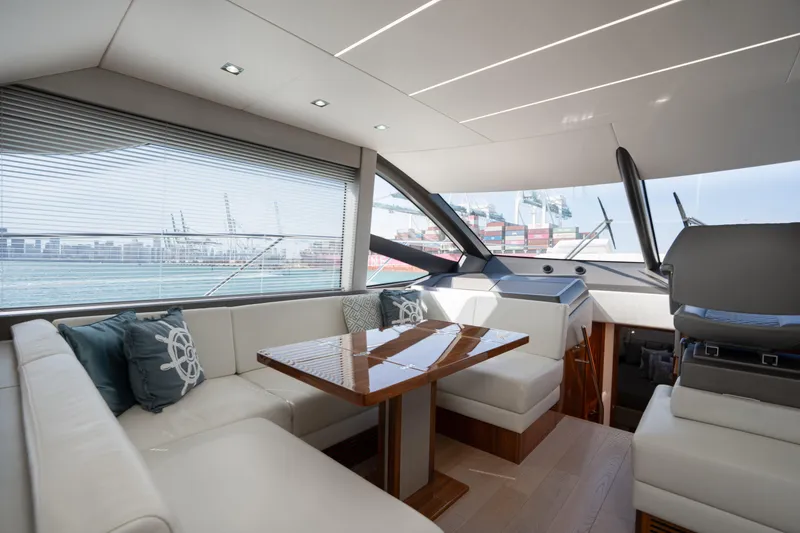 Slide: The Image of Luxurious interior of 2020 Sunseeker 52 Manhattan yacht with elegant seating and modern design. - 14