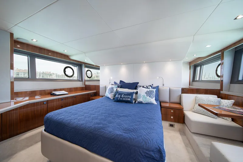 Slide: The Image of Luxurious bedroom interior of 2020 Sunseeker 52 Manhattan yacht with elegant furnishings. - 16