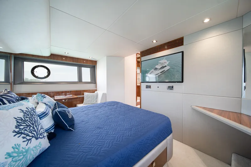 Slide: The Image of Luxurious bedroom interior of 2020 Sunseeker 52 Manhattan yacht with elegant decor. - 17