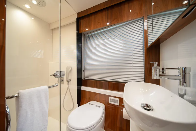 Slide: The Image of Luxurious bathroom in 2020 Sunseeker 52 Manhattan yacht with modern fixtures and elegant design. - 18