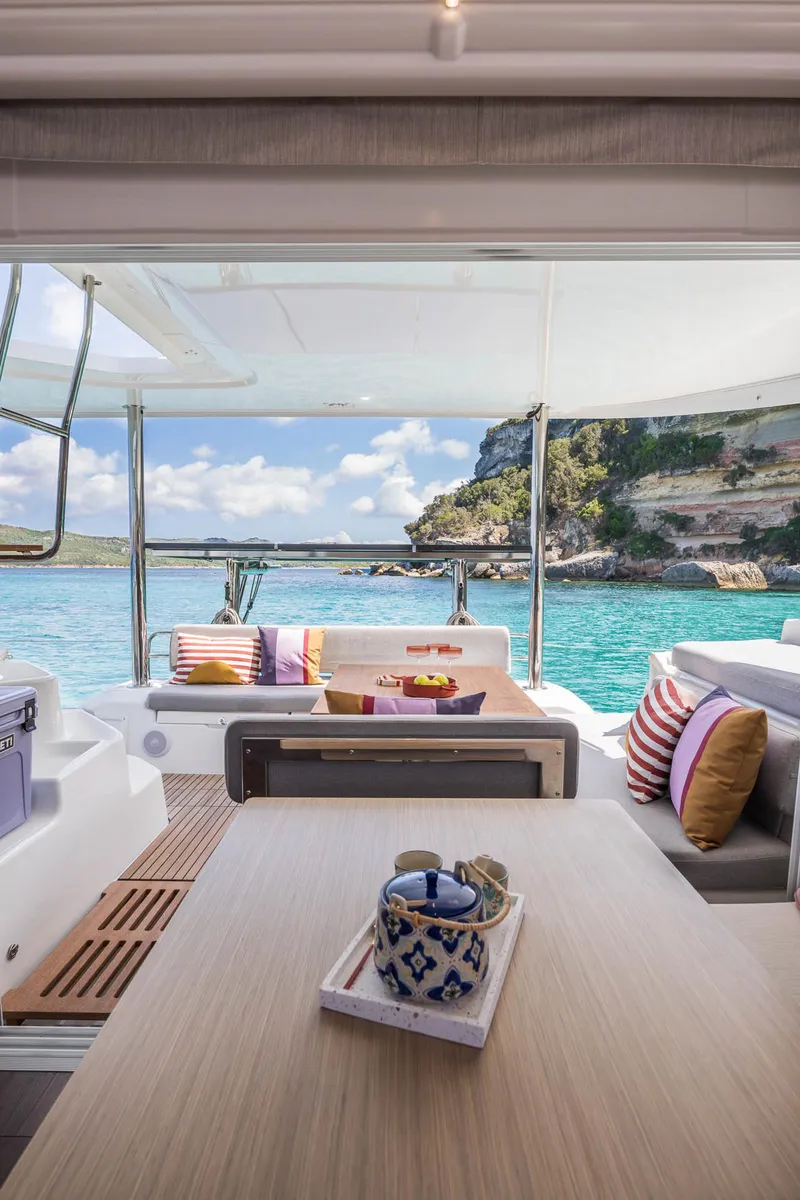 Slide: The Image of Luxurious Lagoon 38 catamaran interior with scenic ocean view, 2025 model. - 31