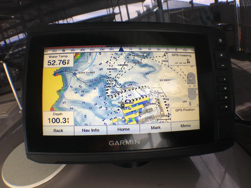 Slide: The Image of Garmin GPS display on 2001 Regal 2660 COMMODORE, showing water temperature and depth. - 7