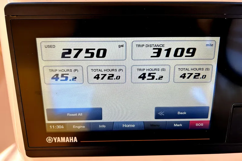 Slide: The Image of Yamaha display showing fuel usage and trip data for 2020 Grady-White Freedom 325. - 18