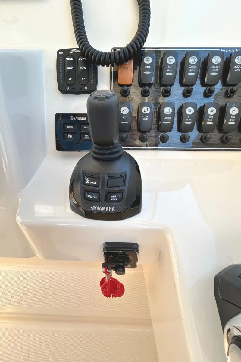 Slide: The Image of Control panel of 2020 Grady-White Freedom 325 boat with Yamaha joystick. - 22