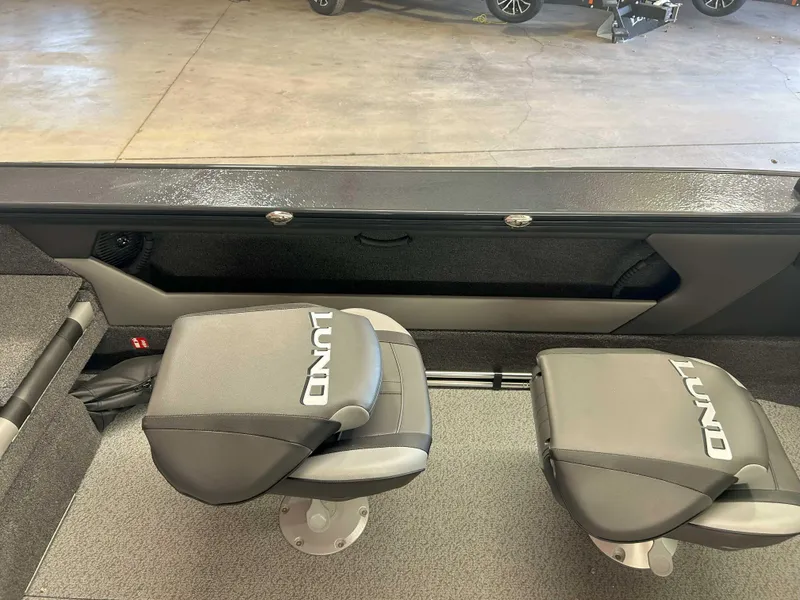 Slide: The Image of Interior of 2025 Lund 1875 Crossover XS boat with two cushioned seats. - 10