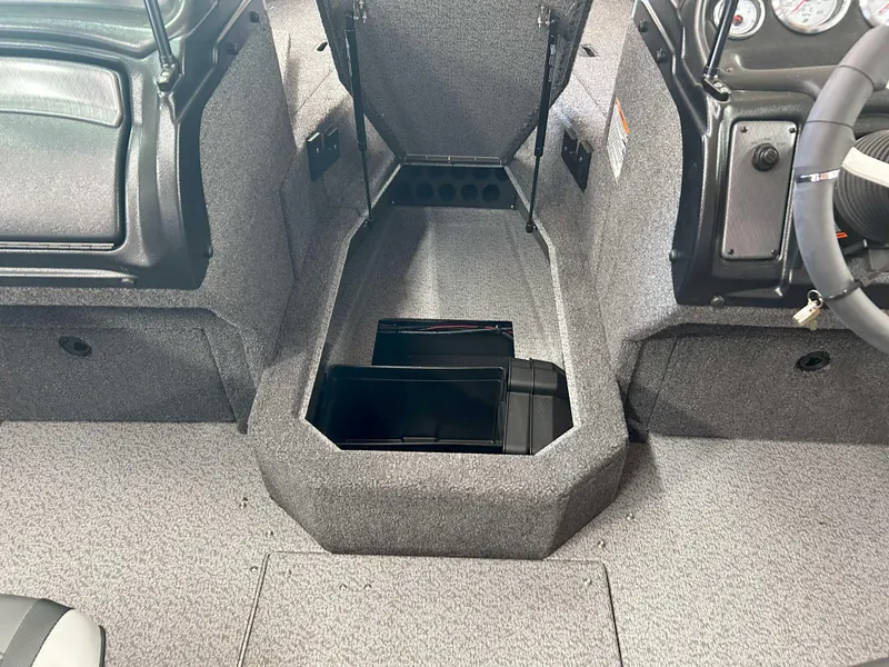 Slide: The Image of 2025 Lund 1875 Crossover XS interior with storage compartments and steering wheel. - 4