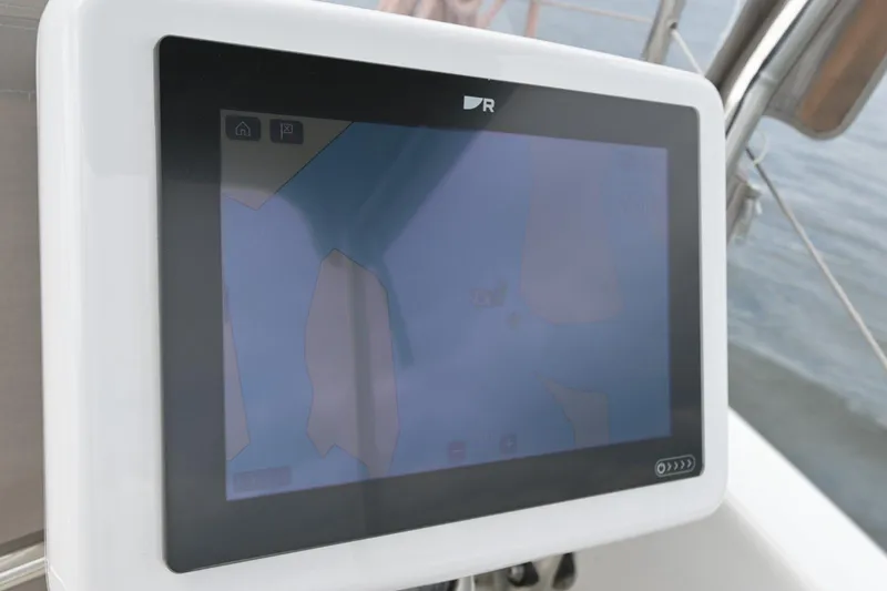 Slide: The Image of Touchscreen display on a 2025 Excess 11 sailboat, showing navigation interface. - 11