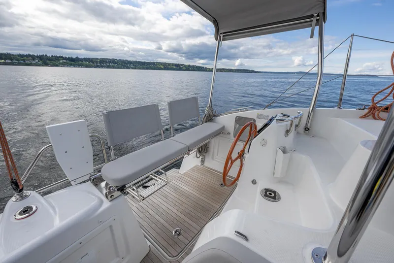 Slide: The Image of 2025 Excess 11 yacht cockpit with modern design on calm waters. - 17