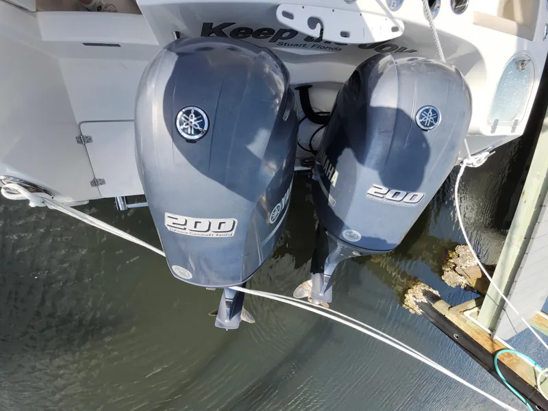Slide: The Image of Twin Yamaha 200 outboard engines on a 2018 Sailfish 270 CC boat. - 26