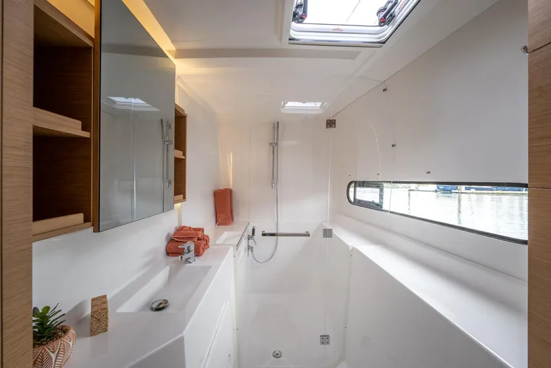 Slide: The Image of Modern bathroom interior in 2025 Excess 11 yacht, featuring sleek design and natural light. - 23
